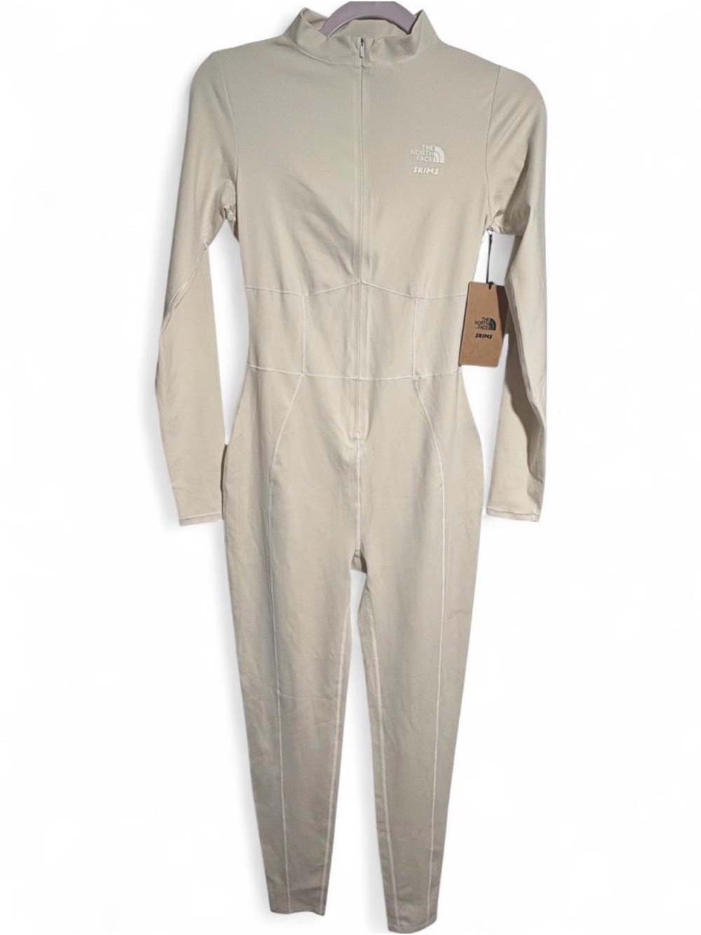 THE NORTH FACE X SKIMS BONE REFINA BODYSUIT SIZE M